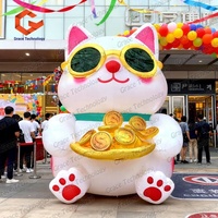 Meilleures ventes : Décoration du Nouvel An - Chat porte-bonheur gonflable Maneki Neko avec lunettes de soleil tendance et pièce d'or