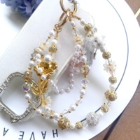 Cadena de lujo para teléfono móvil con cuentas de cristal, borla de perlas y colgante de rosa, personalizable al por mayor