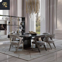 La dernière table à manger italienne de luxe en marbre naturel, ensemble de salle à manger de villa moderne, table à manger créative pour 6 personnes