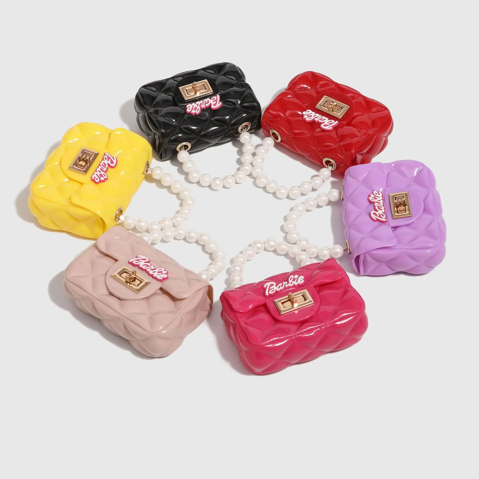 حقائب يد صغيرة للفتيات بألوان الحلوى من أشهر المنتجات المميزة لعام 2024، حقائب يدوية ومحافظ نقود للأطفال، حقائب يد نسائية هلامية فاخرة