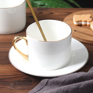 Juego de taza de café y platillo con borde de oro blanco de estilo nórdico, cerámica de China de hueso Simple al por mayor - Product Image 1