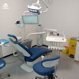 Fauteuil dentaire confortable pour patient avec appui-tête incurvé, plateau à instruments chauffant, faible bruit, démarrage et arrêt progressifs pour réduire l'anxiété - Product Image 1