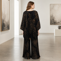 Ensemble deux pièces plissé Miyake élégant pour femme : Tunique longue à imprimé floral artistique et pantalon large, idéal pour les tenues de villégiature et le quotidien