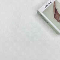 Nouveauté Tissu de tulle en dentelle extensible léger avec jacquard trèfle tissé pour vêtements et textiles d'intérieur