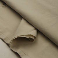 Tissu en polyester 100 % tissé uni teint, effet Coolsilk, toucher coton, haute densité, prix de gros compétitif, pour équipement d'aventure