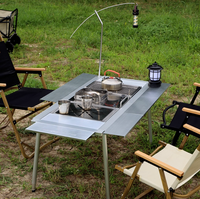 Table pliante portable moderne IGT en aluminium noir et argent pour camping et pique-nique en plein air