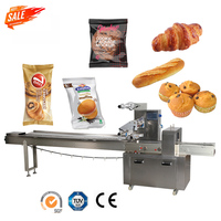 Machine d'emballage multifonctionnelle automatique horizontale pour sacs/pochettes/films de boulangerie, pain, croissants, pains à hamburger, gâteaux, snacks