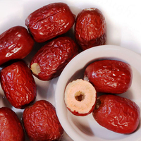 Chinese populaire gevriesdroogde ontpitte jujubes en rode dadels, zoete snack, knapperig, zonder pitjes, in bulkverpakking