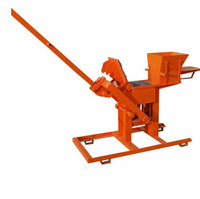 Presse manuelle à briques d'argile à bas prix, machine de fabrication de blocs d'argile emboîtables, cadre en acier haute sécurité à vendre au Kenya