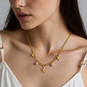Collier pendentif étoile de la série Ocean, en alliage de zinc plaqué or 18 carats, pour femmes, bijoux de fête - Product Image 1