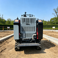Chargeuse compacte robuste avec changement d'attaches facile pour les travaux de maintenance routière