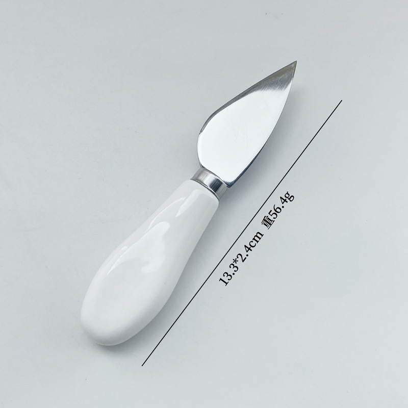 Couteau à fromage en forme de coeur avec manche en céramique blanche