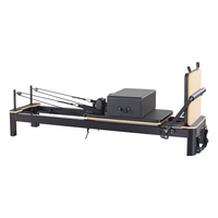 Réformateur de Pilates en aluminium de studio blanc noir argenté personnalisé comprend une rallonge de boîte de siège sangles à double boucle