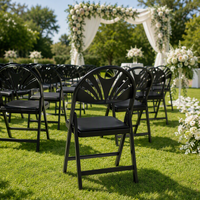 Chaise pliante en résine PC noire de qualité supérieure avec dossier éventail et assise rembourrée en PU souple, robuste, idéale pour événements, mariages et banquets, disponible à la location