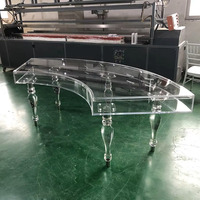 Table de mariage transparente en acrylique Offre Spéciale Table d'événement de fête d'hôtel de forme ronde et incurvée pour la location