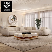 Luxuriöses Gebogenes Modulares Ecksofa mit Gehämmerter Messingbasis Modernes Designer-Wohnzimmermöbel Maßgefertigtes Polstersofa