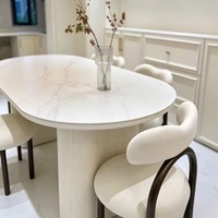 Nordischer Trendiger Kleiner Esstisch, Französischer Creme-Stil Ovaler Gesinterter Stein-Esstisch mit Wellenförmiger Basis