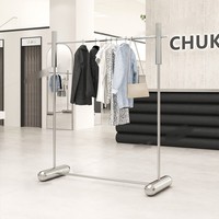 Estante de exhibición de ropa de acero inoxidable brillante para tienda, perchero para abrigos de mujer con colgadores laterales, estante de exhibición tipo isla central de suelo a techo