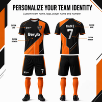 Seragam Sepak Bola Kustom Klub Oranye Hitam Bauhaus Energetik Mesh Transfer Panas Cepat Kering Bernapas 100% Poliester Unisex