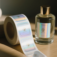 Couche de vérification de codes-barres produit parfum holographique traçable vide gravé au laser inviolable pour étiquette de superposition holographique