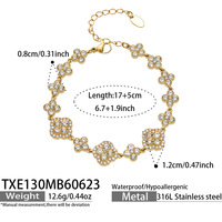Boucles d'oreilles, bague, bracelet, collier en acier inoxydable plaqué or 18 carats avec fleur à quatre feuilles incrustée de strass super brillants