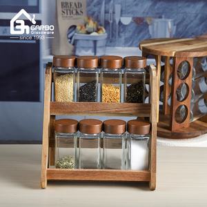 9 pz set <span class=keywords><strong>di</strong></span> bottiglie <span class=keywords><strong>di</strong></span> condimento <span class=keywords><strong>con</strong></span> Stand <span class=keywords><strong>di</strong></span> forma quadrata bottiglia <span class=keywords><strong>di</strong></span> <span class=keywords><strong>vetro</strong></span> <span class=keywords><strong>con</strong></span> <span class=keywords><strong>coperchio</strong></span> in legno vendita calda nel mercato Algeria fornitore della cina - Product Image 1