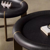 Table basse ronde en bois noir de design italien, ensemble de tables gigognes de luxe avec bord rembourré, mobilier de salon pour villa et hôtel
