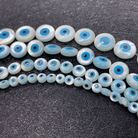 Perles de forme ronde en gros nacre turquoise coquille ronde coquille d'oeil perle pleine forée pour bijoux à bricoler soi-même