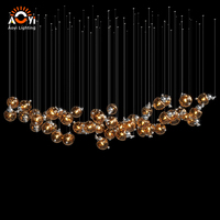 Plafonnier LED Aoyi Lighting en verre ambré irrégulier - Décoration artistique contemporaine pour espaces commerciaux haut de gamme