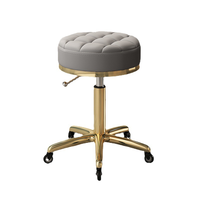 Mobilier de salon de haute qualité Chaise de coiffure réglable à 360 degrés avec roues Tabouret de salon doré