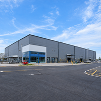 Bâtiment commercial moderne en structure métallique, résistant aux intempéries, durable, pour atelier, supermarché ou commerce de détail
