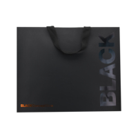 Sac en papier noir de luxe écologique personnalisé avec logo en feuille d'or, compatible micro-ondes et réutilisable pour les boutiques, sacs cadeaux