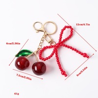 Nouveau porte-clés cerise pour femme avec breloques fruitées, perles et décorations en forme de cœur, pendentifs 3D de luxe pour sacs à main et voitures, cadeau de Saint-Valentin