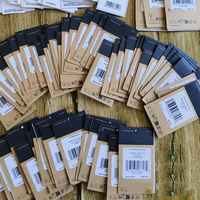 Étiquettes de vêtements RFID UHF 860-960 MHz ISO18000-6C, autocollants PET étanches avec portée de lecture de 1 à 8 m pour la gestion des vêtements