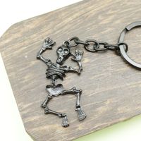 Porte-clés Crâne Dansant en Alliage de Zinc avec Anneau et Chaîne pour Sac de Bonbons ou Farces