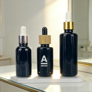 15ml 20ml 30ml 50ml 60ml 100ml Wholesale Black UV-resistant Violet Glass Essential Oil <b>Bottle</b> with Bamboo <b>Dropper</b> Cap - Product Image 1