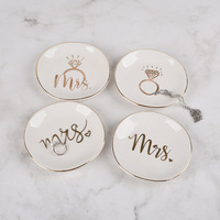 Vente en gros Assiette à bijoux en céramique moderne personnalisée avec bordure dorée Plateau à vaisselle pour présentoir à bagues avec logo personnalisé