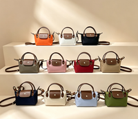 Sac à bandoulière messager léger en nylon contrastant, mini sac à dumplings portable et tendance pour femmes, nouvelle collection 2026