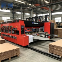 Machine d'impression de boîtes en carton ondulé HUAZHU 1224 entièrement automatique 4 couleurs avec imprimante flexographique à encre aqueuse, rainureuse et découpeuse