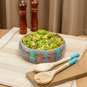 Vibrant, hand-painted wooden salad <b>bowl</b> featuring a bright blue exterior with <b>pink</b> floral art, available at wholesale prices. - Product Image 1