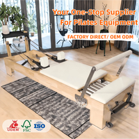 Private Label Premium Pilates Reformer mit Eichenholzrahmen und leisen Rollen, Pilates Reformer-Bett für Fitness-Studios