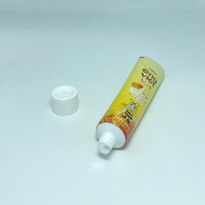 Tube de dentifrice en plastique imprimé jaune avec bouchon à vis blanc, emballage de crème cosmétique pour les soins des enfants ABL - Product Image 1