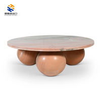 Table basse en marbre brossé/polissé sur mesure de la marque française de luxe KT STONE, design moderne, pour salon et hôtel