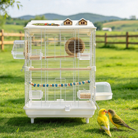 Cage à oiseaux élégante blanche avec toit, nichoir, accessoires complets, mangeoire, perchoir et balançoire pour l'élevage de petits perroquets