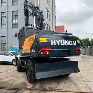 Excavatrice sur pneus Hyundai 210W-9T d'occasion à prix abordable, modèle 2023, poids opérationnel de 21 tonnes, moteur, boîte de vitesses, PLC, en promotion - Product Image 6