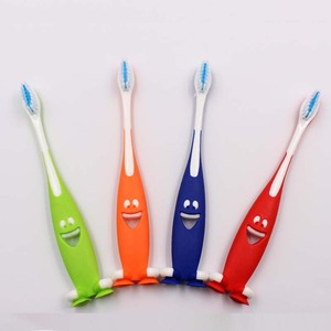 Brosse à dents manuelle colorée pour enfants avec ventouse et poils haute densité, motif Smiley Face - Product Image 1
