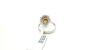 Oval Sphene Gemstone and Diamond Halo <b>Cocktail</b> <b>Ring</b> in White <b>Gold</b> elegant white <b>gold</b> <b>cocktail</b> <b>ring</b> features a vibrant <b>Ring</b> - Product Image 5