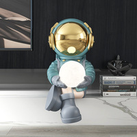 Prix usine galaxie astronaute ornement amusant planète astronaute Statue pour la maison salon artisanat