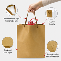 Sac en papier kraft personnalisé avec poignée en corde de coton, logo estampé à chaud, sac fourre-tout cadeau, vente en gros pour l'emballage des magasins de vêtements