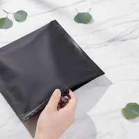 Sac à fermeture éclair coulissante noir mat de luxe avec logo personnalisé, fermeture éclair circulaire à anneau pour l'emballage des vêtements, sacs en PE givrés imperméables
